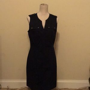 Black button pocketed dress.